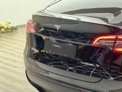 Tesla Model Y Standard Range RWD - ფოტო 18