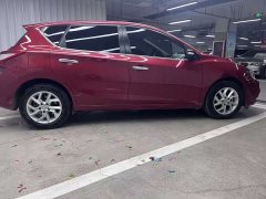 Nissan Qida Tiida 1.6L CVT Smart Edition - ფოტო 3