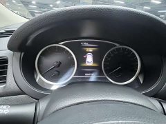 Nissan Qida Tiida 1.6L CVT Smart Edition - ფოტო 8