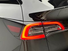 Tesla Model Y Rear-Wheel Drive - ფოტო 18