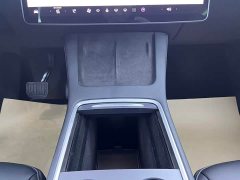 Tesla Model Y Standard Range RWD - ფოტო 10
