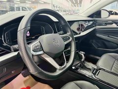 Volkswagen Passat 330TSI Elite - ფოტო 13