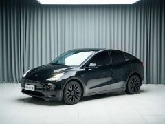 Tesla Model Y Rear-Wheel Drive - ფოტო 1