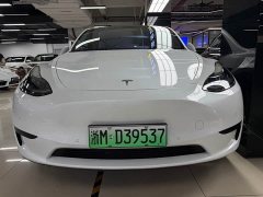 Tesla Model Y Rear-Wheel Drive - ფოტო 1