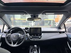 Toyota Corolla Hybrid 1.8H E-CVT Luxury - ფოტო 4