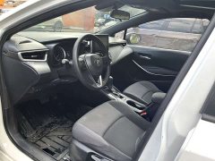 Toyota Corolla Hybrid 1.8H E-CVT Luxury - ფოტო 5