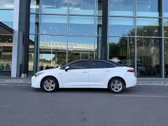 Toyota Corolla Hybrid 1.8H E-CVT Base - ფოტო 7
