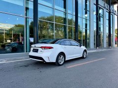 Toyota Corolla Hybrid 1.8H E-CVT Base - ფოტო 9