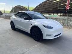 Tesla Model Y Long Range All-Wheel Drive - ფოტო 3