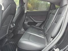 Tesla Model Y Standard Range RWD - ფოტო 11