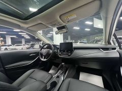 Toyota Corolla 2021 Hybrid 1.8L E-CVT Elite - ფოტო 19