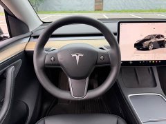 Tesla Model Y Standard Range RWD - ფოტო 10