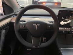 Tesla Model Y Standard Range RWD - ფოტო 10