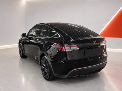 Tesla Model Y Rear-Wheel Drive - ფოტო 4