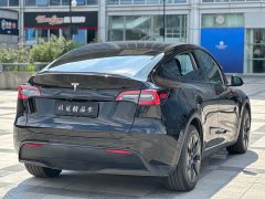 Tesla Model Y Rear-Wheel Drive - ფოტო 5