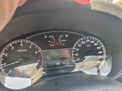 Nissan Qida Tiida 1.6L CVT Smart Edition - ფოტო 12