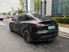Tesla Model Y Standard Range RWD - ფოტო 9