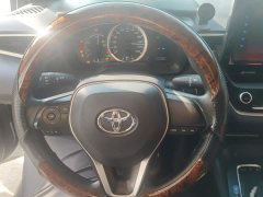 Toyota Corolla Hybrid 1.8H E-CVT Base - ფოტო 15