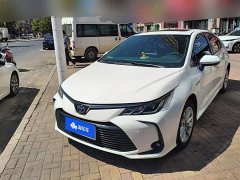 Toyota Corolla 2021 Hybrid 1.8L E-CVT Elite - ფოტო 1