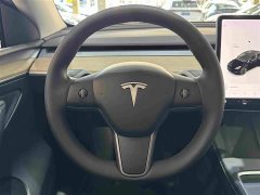 Tesla Model Y Standard Range RWD - ფოტო 10