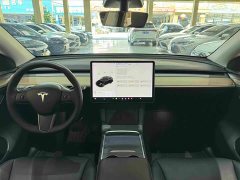 Tesla Model Y Standard Range RWD - ფოტო 9