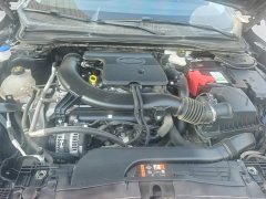 Ford Mondeo 2.0T EcoBoost Luxury - ფოტო 10