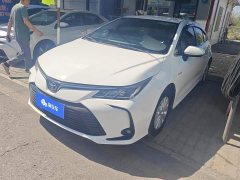 Toyota Corolla 2021 Hybrid 1.8L E-CVT Elite - ფოტო 1