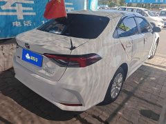Toyota Corolla 2021 Hybrid 1.8L E-CVT Elite - ფოტო 3