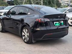 Tesla Model Y Standard Range RWD - ფოტო 9