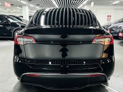 Tesla Model Y Rear-Wheel Drive - ფოტო 4