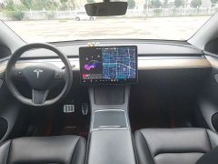 Tesla Model Y Standard Range RWD - ფოტო 10