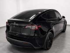 Tesla Model Y Standard Range RWD - ფოტო 4