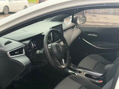 Toyota Corolla Hybrid 1.8H E-CVT Luxury - ფოტო 4