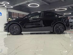 Tesla Model Y Rear-Wheel Drive - ფოტო 4