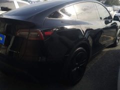 Tesla Model Y Rear-Wheel Drive - ფოტო 3