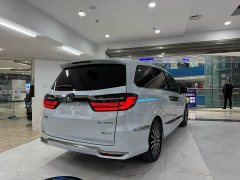Honda Odyssey 2.0L e:HEV Luxury - ფოტო 9