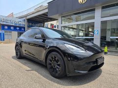 Tesla Model Y Rear-Wheel Drive - ფოტო 1