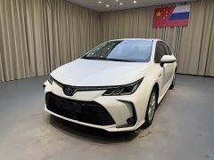 Toyota Corolla 2021 Hybrid 1.8L E-CVT Elite - ფოტო 1