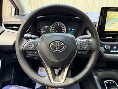 Toyota Corolla 2021 Hybrid 1.8L E-CVT Elite - ფოტო 15