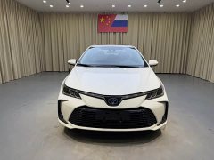 Toyota Corolla 2021 Hybrid 1.8L E-CVT Elite - ფოტო 2
