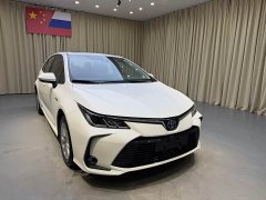Toyota Corolla 2021 Hybrid 1.8L E-CVT Elite - ფოტო 3