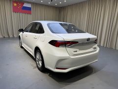 Toyota Corolla 2021 Hybrid 1.8L E-CVT Elite - ფოტო 4