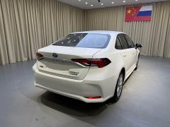 Toyota Corolla 2021 Hybrid 1.8L E-CVT Elite - ფოტო 6