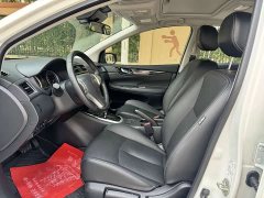Nissan Qida Tiida 1.6L CVT Smart Premium Edition - ფოტო 4