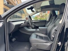 Tesla Model Y Rear-Wheel Drive - ფოტო 4