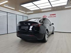 Tesla Model Y Long Range All-Wheel Drive - ფოტო 4