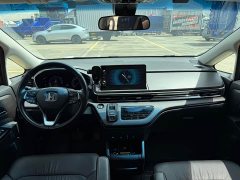 Honda Odyssey 2.0L e:HEV Luxury - ფოტო 10