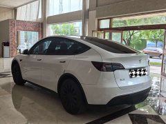 Tesla Model Y Rear-Wheel Drive - ფოტო 2