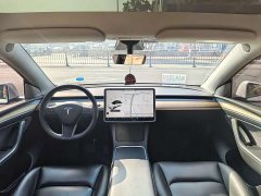 Tesla Model Y Standard Range RWD - ფოტო 11