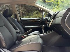 Nissan Qida Tiida 1.6L CVT Smart Edition - ფოტო 11